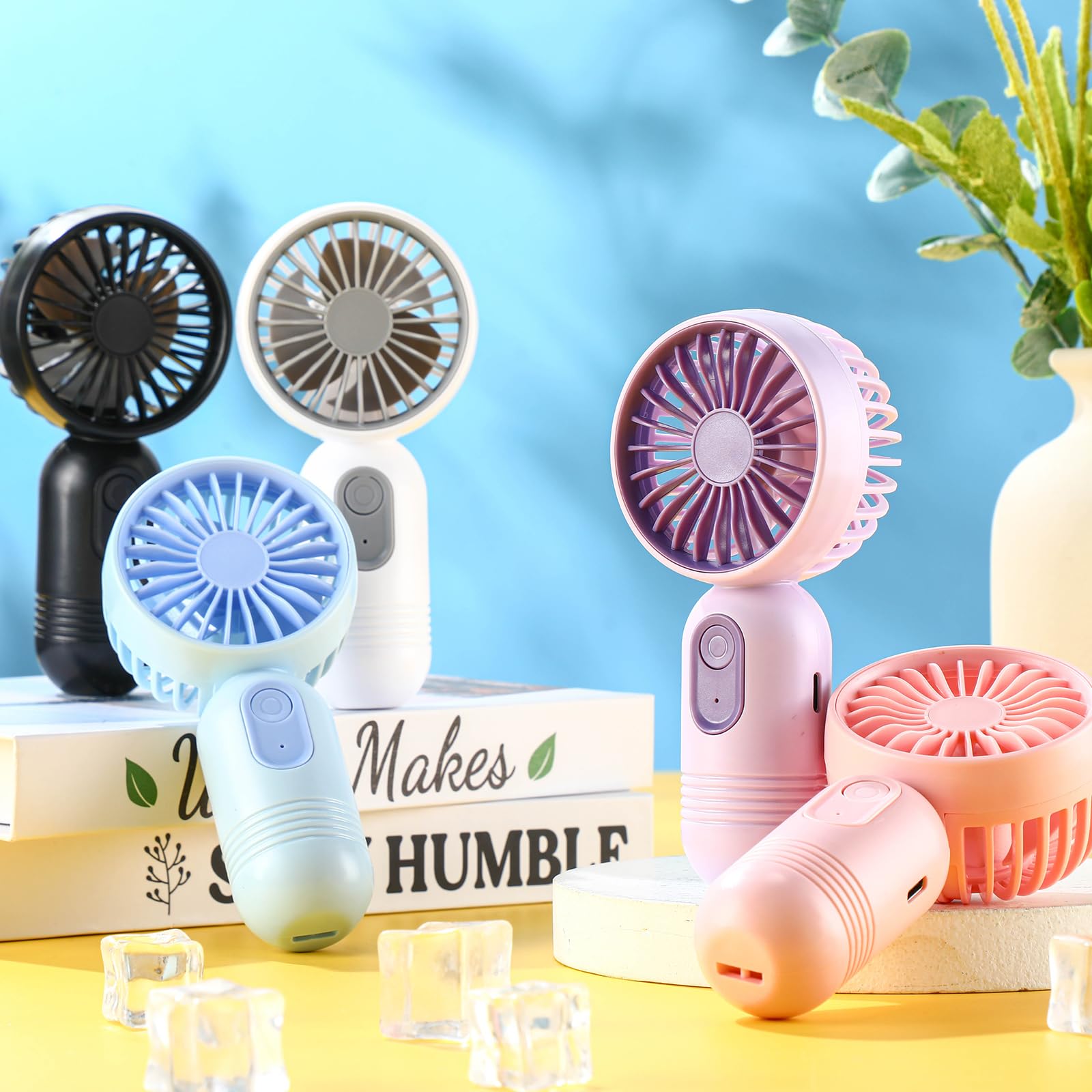 Lightweight handheld fans with USB charging perfect for travel beauty and personal use