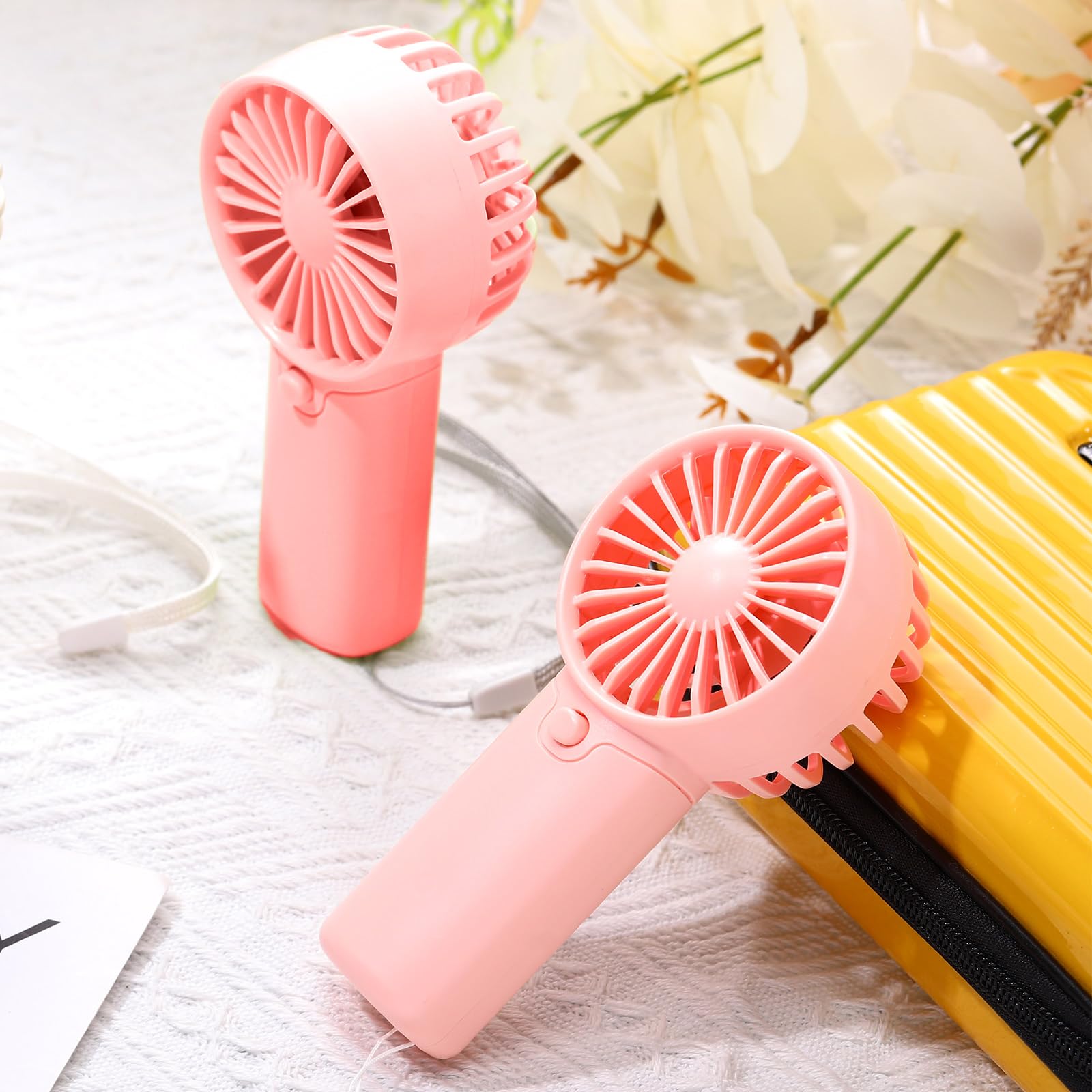 Handheld cooling fans great for summer travel gifts and outdoor adventures