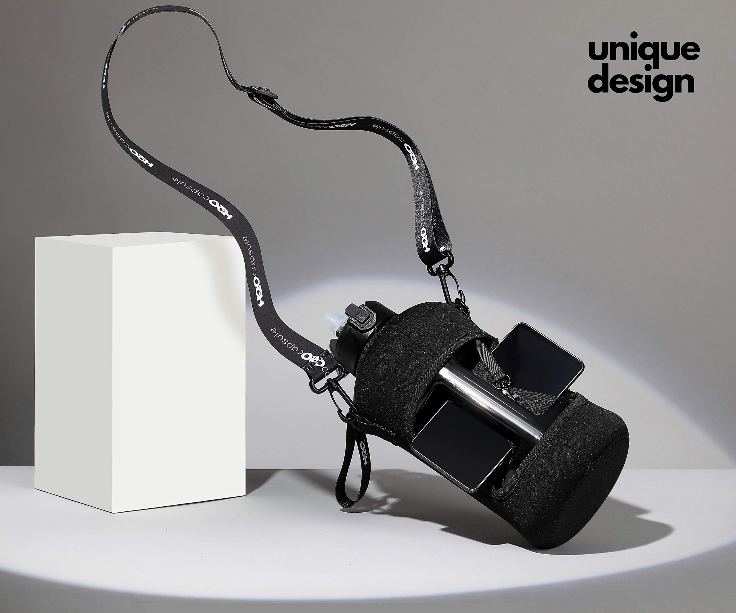 H2O Capsule 2.2L Half Gallon Water Bottle With Storage Sleeve And Covered Straw Lid