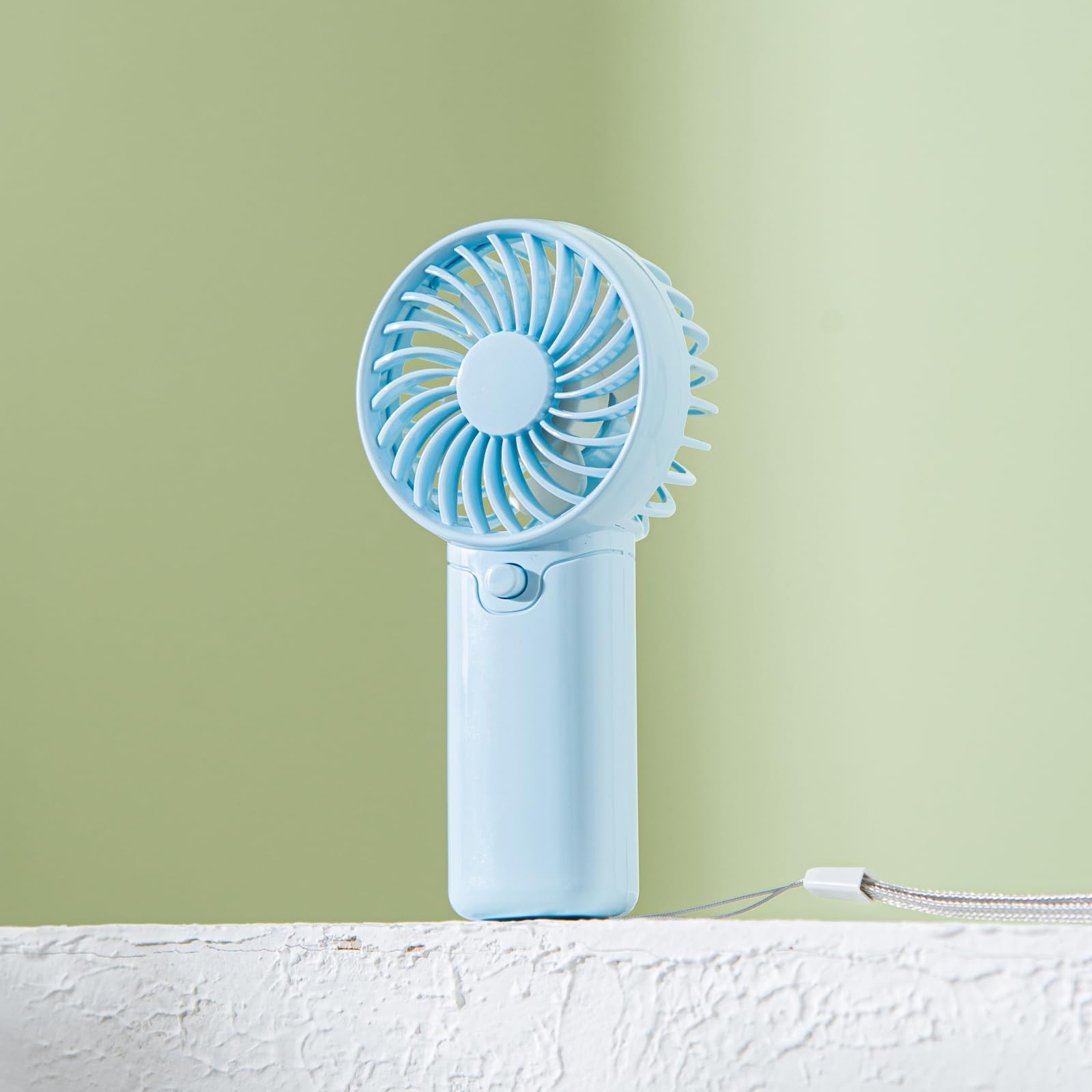 Quiet portable fan for personal use, battery operated for cooling in bedrooms, camping, or outdoor events