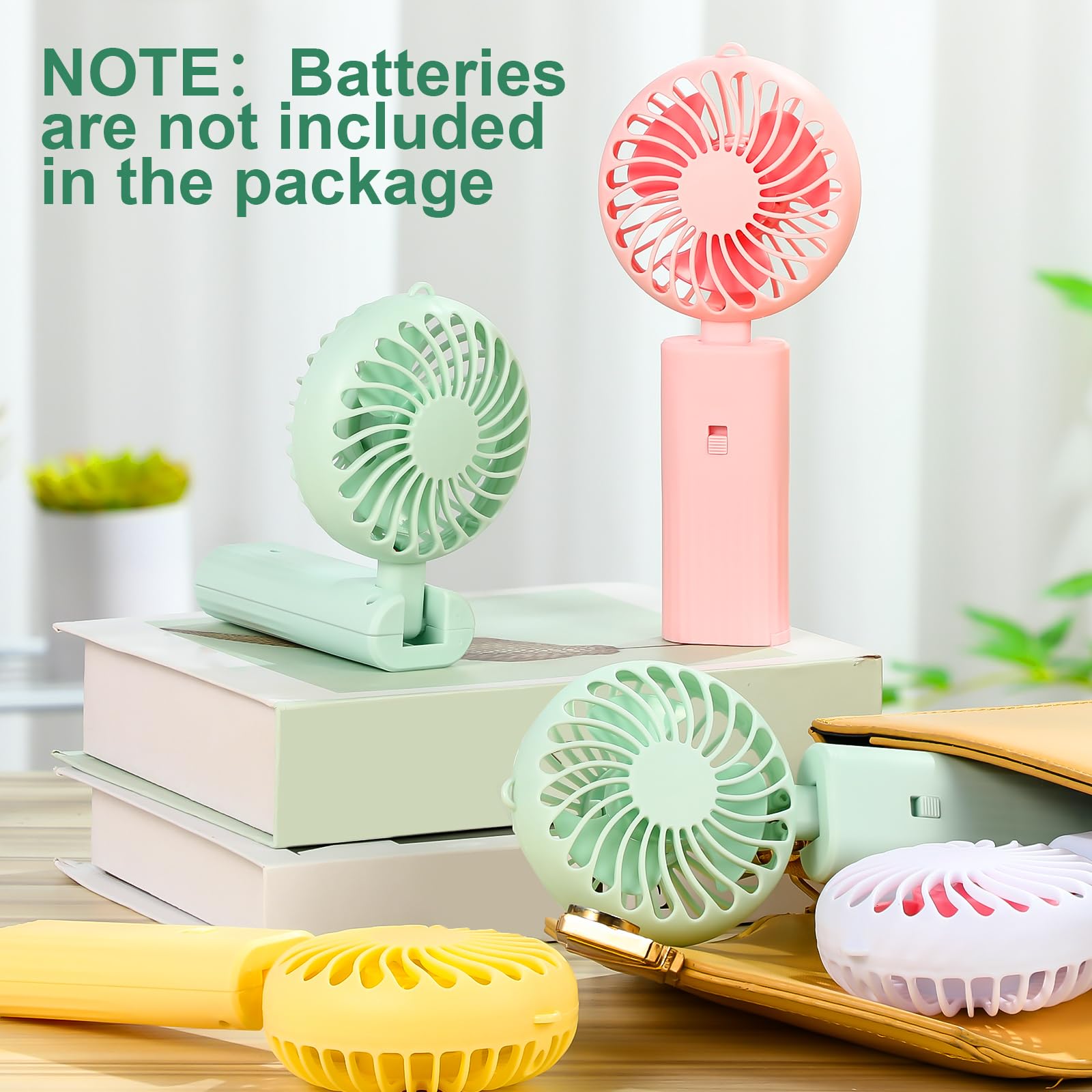 Battery operated foldable mini fans in bulk ideal for cooling at work or on-the-go Koospark