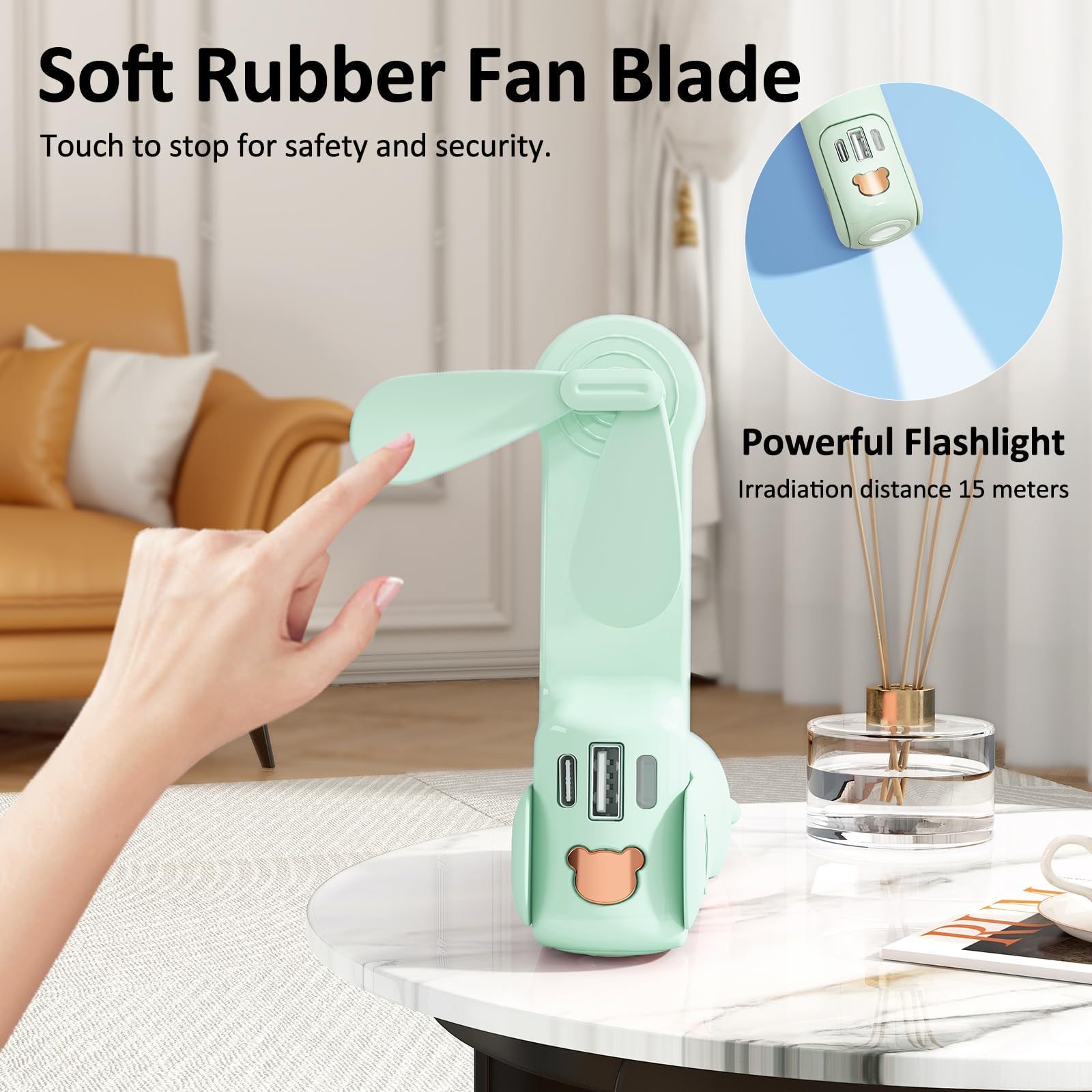 Handheld fan with 26-hour runtime, flashlight, and power bank perfect for outdoor adventures