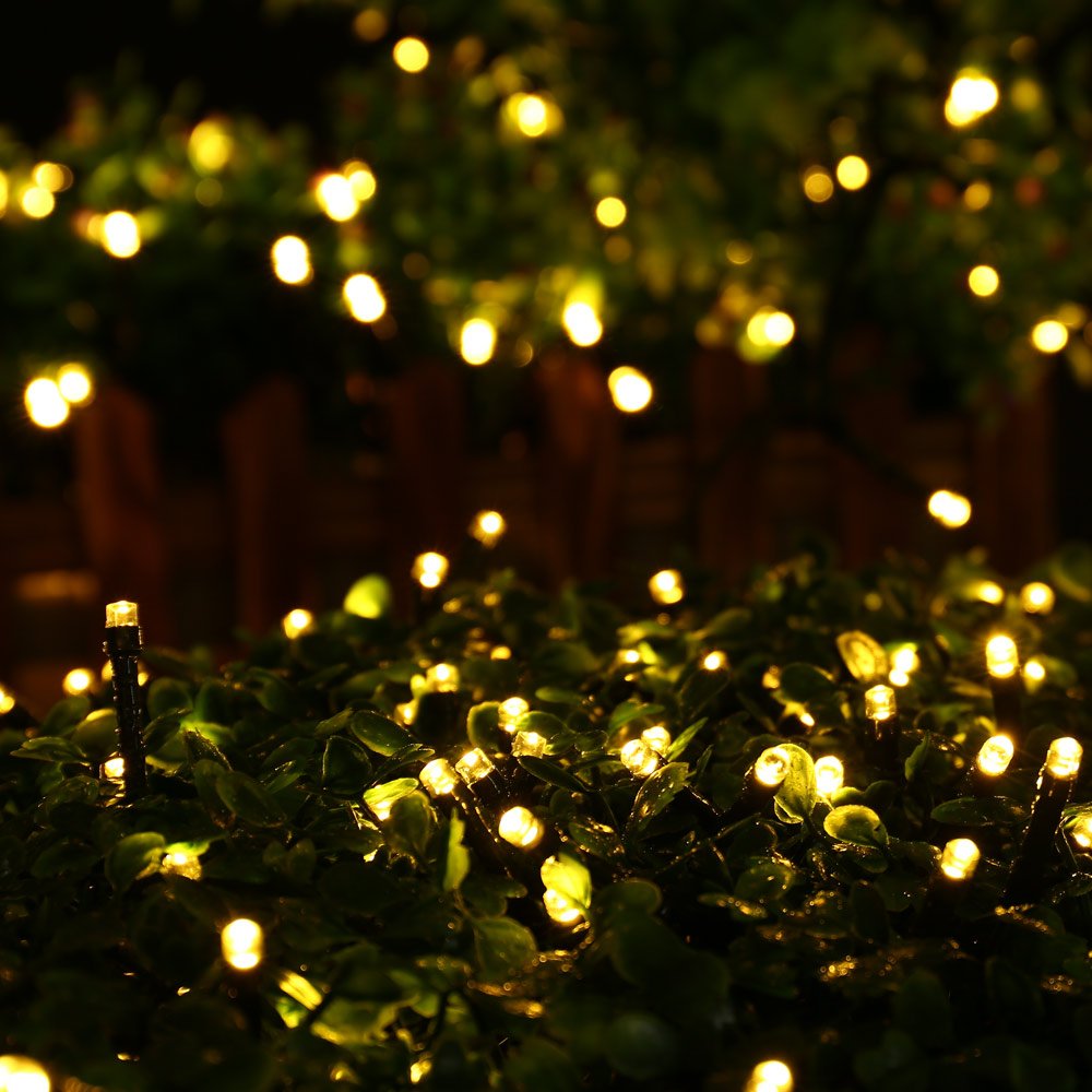 Ishabao Solar Christmas Lights Outdoor, 33Ft 100 Led Solar Fairy String Lights 8 Modes Waterproof Xmas Lights For Garden, Patio, Home, Party, Wedding, Holiday, Tree, Bush, Wreath, Outdoor Decor (Warm White)