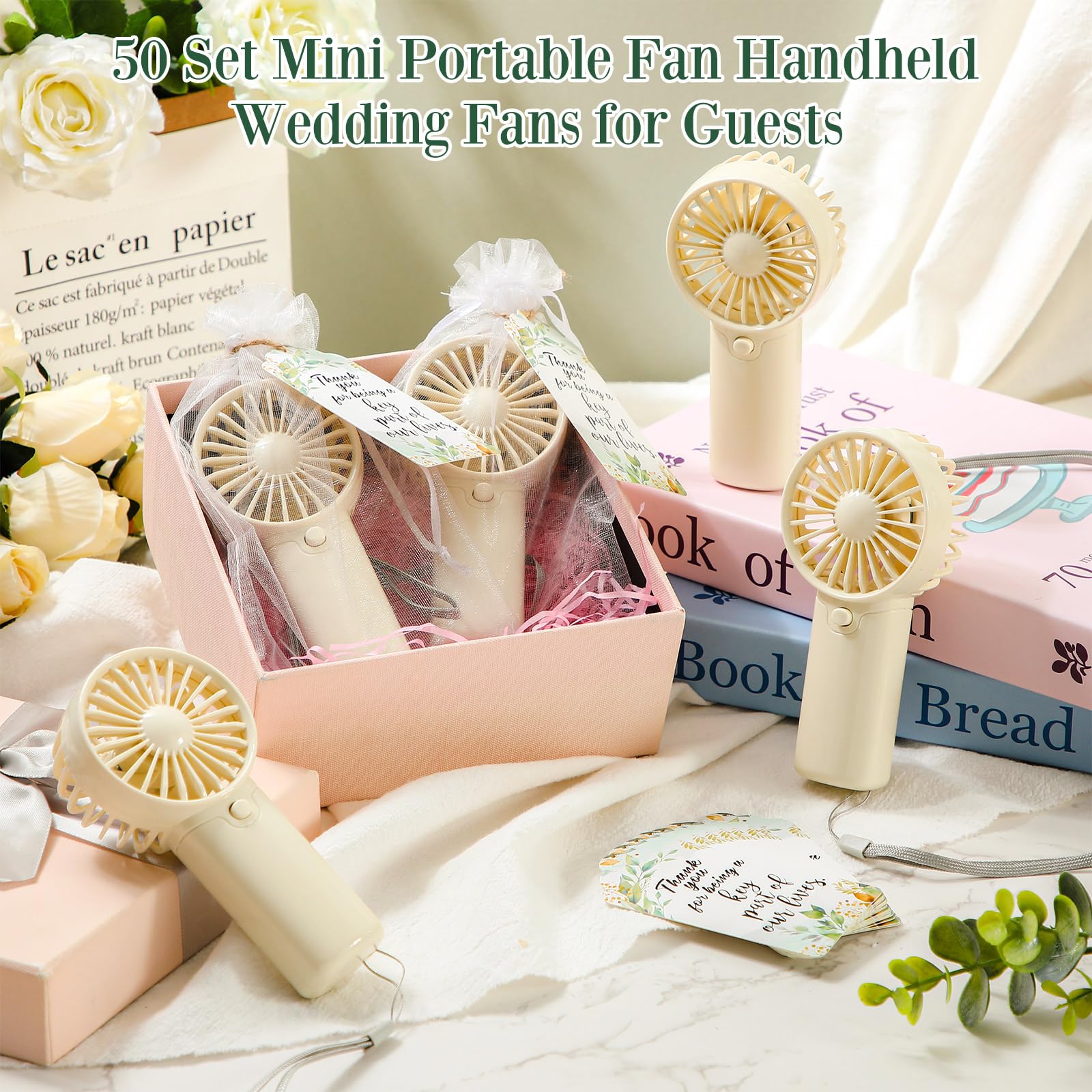 Portable handheld wedding fans with battery operation, ideal for guest comfort and summer weddings Koospark